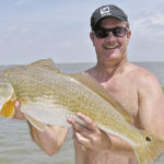 Hooked in 2-foot depths, a 12-pound red can’t dive down, so he zooms off like a rocket. Talk about a BLAST!