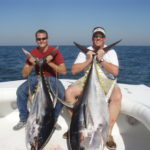 Jimmy Fisackerly (aka "Boat Stuf"), right, landed this stud 221-poun yellowfin on Saturday (Oct. 9) about 30 miles off the mouth of the Mississippi River.