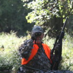 A good pair of binoculars can help pick out deer bedded down on the creek bank.