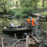 Wearing waders allows the hunter to get out and drag his pirogue over logs and other obstructions.