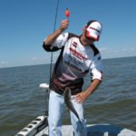 Cheramie wrangles a Lake Raccourci speck.