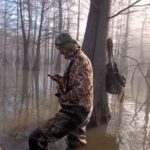 What would waiting on ducks be like without the conveniences of modern technology that allows you to check to see if your buddies are shooting anything.