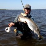 This trophy speckled trout at 9½ pounds was taken by Capt. Bruce Baugh on a Paul Brown’s broke-back Corky when wade-fishing in Calcasieu Lake in the spring of 2013.