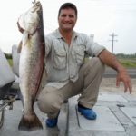 Jason Ellender of Sulphur displays his monster speckled trout weighed on certified scales at 10.65 pounds and taken on eastern Sabine Lake. It is the new No. 8 in Louisiana Fish Records.