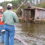 There aren’t boats in old boat sheds like this one, but early morning bass like to hang out here.