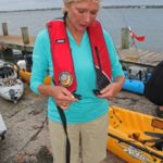 Even in shallow waters, it’s best to wear your lightweight PFD while kayaking.