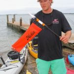 A lighted safety flag ensures that boaters can see kayakers from a distance.