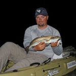 Speckled trout are one of the top targets for nighttime kayak fishing.