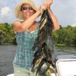 The author’s wife Christine with a good mess of basin bream when the water is right.