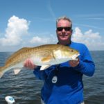 Danos found a school of big bull reds churning the water under a flock of diving, screaming terns at Pointe a la Hache.