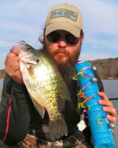 Jay Stone with two tubes of “kitchen sink” lures neatly wrapped and ready to go fishing again.
