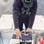 Searching for fuzz with his depth finder, Ty Hibbs stops and fishes wherever he spots blobs of what he calls “lava” on his screen.