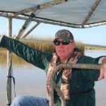 Capt. Ryan Lambert, with Cajun Fishing Adventures, talks about the recent successes of sediment diversions during a tour of marshes east of the Mississippi River near Buras.