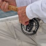 Getting a fish “on the reel” means to use a fly reel to fight a fish similar to what is done with a level-wind reel.
