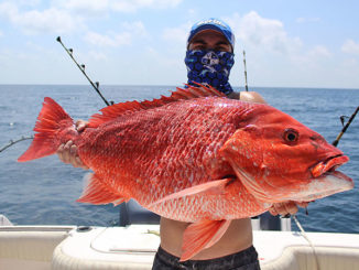 Andrew Duval, 17, of Patterson with a red snapper caught 120 miles into the Gulf from Berwick.