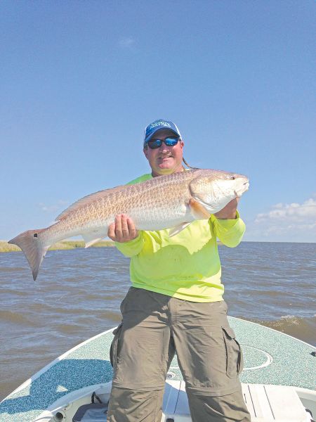 Trout aren’t the only fish swimming around the northeastern islands of the Biloxi Marsh — there also are some hammer reds that will stretch your line.