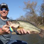 When the water’s muddy, making contact with cover will help fish notice your baits.