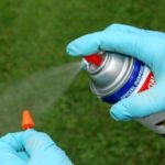 5- Insert a piece of a round toothpick in the center of the large end of the cork and spray paint the cork with fluorescent orange or other high-visibility paint.