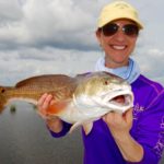 Redfish are abundant in the Biloxi Marsh, a perfect way to round out your box after catching speckled trout early on the rigs in Lake Borgne.