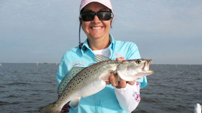 Nancy Comeaux shows off the type of Grand Isle specks anglers flock to the island for in June.