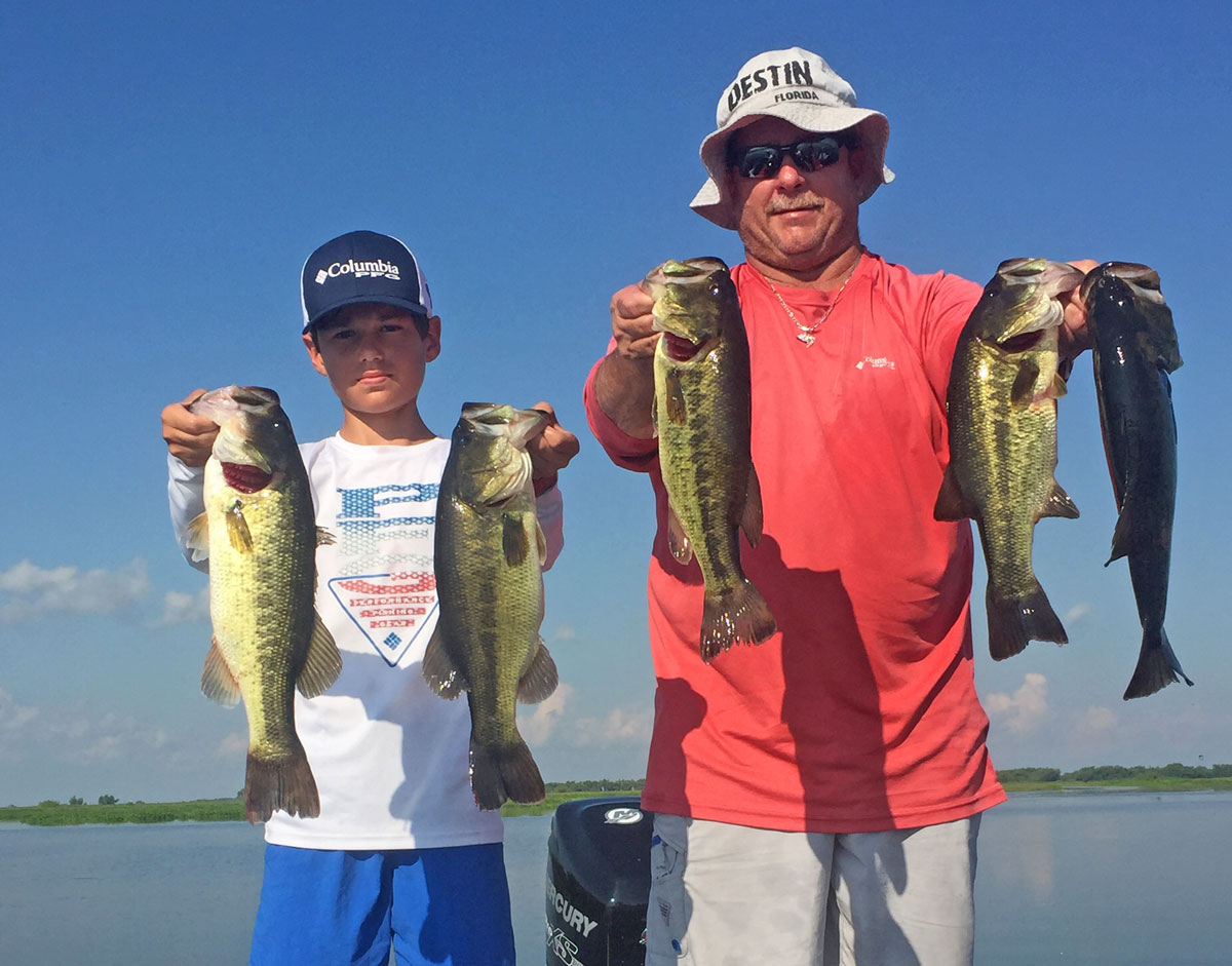 Lane Martin of Paulina and his son, Jace, hold up a nice stringer of bass out of Bayou Black.