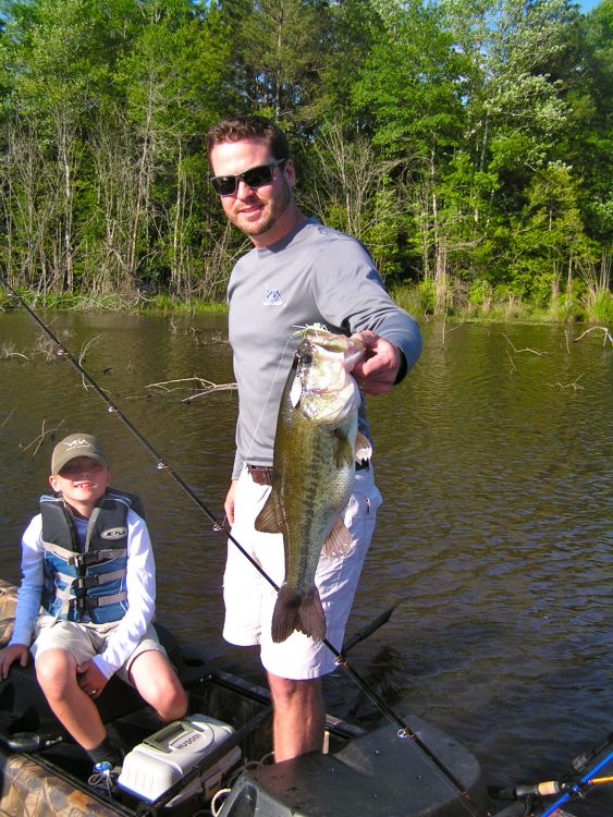 Jody Wood and his son Hudson display the type of bass you can catch in July.