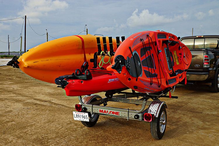 Kayak trailers like this Malone MicroSport are lightweight and can be configured to easily carry multiple kayaks.