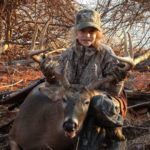 Smith’s daughter Hannah poses with her first huge north Louisiana buck.