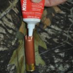 4) Using standard bathroom caulk, fill the bottom third of the shell.