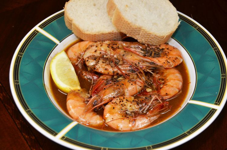 Purchase plenty of French bread to serve with Laina’s Barbeque Shrimp to sop up the dish’s delicious juices.