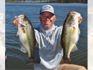Guide Darold Gleason shows off a couple of nice bass up at Toledo Bend.