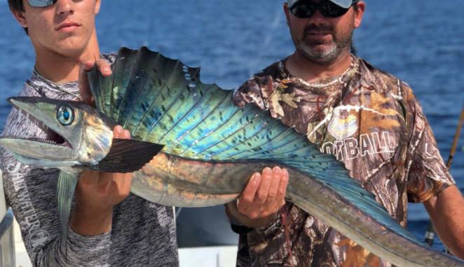Josh and Jamie Gaspard both with the wicked-looking lancetfish they caught on Wednesday, Aug. 15 about 120 miles out of Fourchon in the Green Canyon.