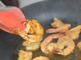 The secret to Bronzed Shrimp is searing the outsides of the shrimp over very high heat without burning the insides.