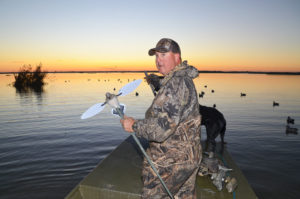 Creighton Ward prefers dove spinning wing decoys over larger mallard spinners, and sets them about 1 ½ feet over the water. 