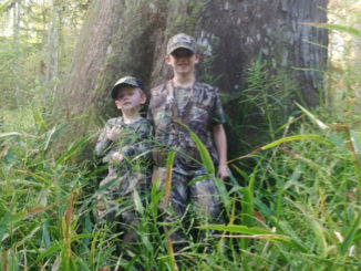 William and John Guidry enjoyed their squirrel opening day outing on Pearl River WMA. This cypress tree is one of the giants left around from the good old days.