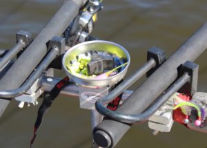 A simple sink stopper is a great crappie nibble holder.