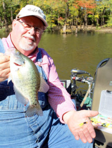 A Black Lake hair jig is Warren Maxwell’s go-to bait. As you can see, he has a whole box of hair jigs for big crappie like this one.