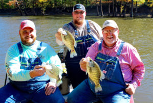 Team Overalls, from left, Justin, Josh and Warren Maxwell with three good crappie.