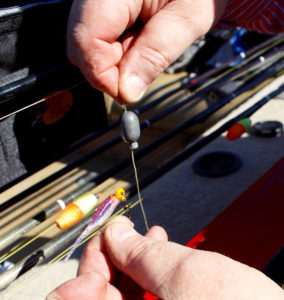 A big weight helps keep your bait in the crappie strike zone in deep water.
