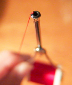 If your thread breaks on occasion, upgrade your bobbin to one with a ceramic ring inserted in the metal tube.