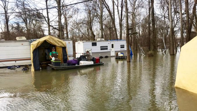 Tensas Parish deer hunters removed gear from their campers as flood waters rose in January. Even mobile camps like these got flooded because before water rose quickly, and roads went under and were closed.