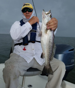 A Berkley Rattle Shrimp in either coastal candy or glow has been Capt. Tommy Pellegrin's main lure for a hot speck run in outside waters this month out of Cocodrie. 