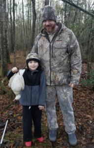 Greg Willis and his grandson Grayson pose with the white wood duck Wilis shot off the Calcasieu River in Allen Parish. Paul Link, with the LDWF, couldn't confirm from the pictures if the bird was a true albino or leucistic. 