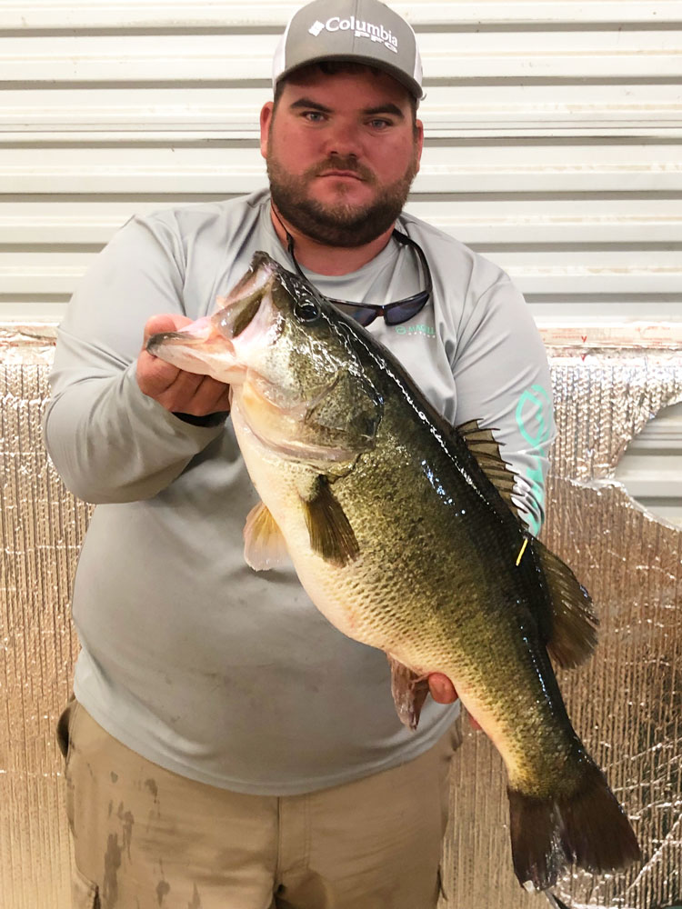 Kyle Alexander, of Baker, shows off the 10.41-pound lunker bass he caught on Feb. 15 at Toledo Bend near Turtle Beach. The big fish bit a jerkbait in 10 to 12 feet of water at about 12:30 p.m., Alexander said. 