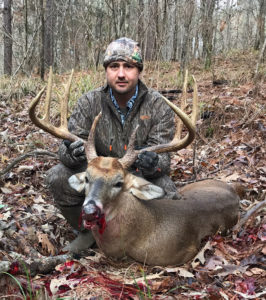 Benji Nelson, of Sicily Island, poses with the big 12-point Catahoula Parish buck he shot on Dec. 29. The big deer stretched the tape to more than 173 inches, and is currently in first place in Simmons' Sporting Goods muzzleloader division. 