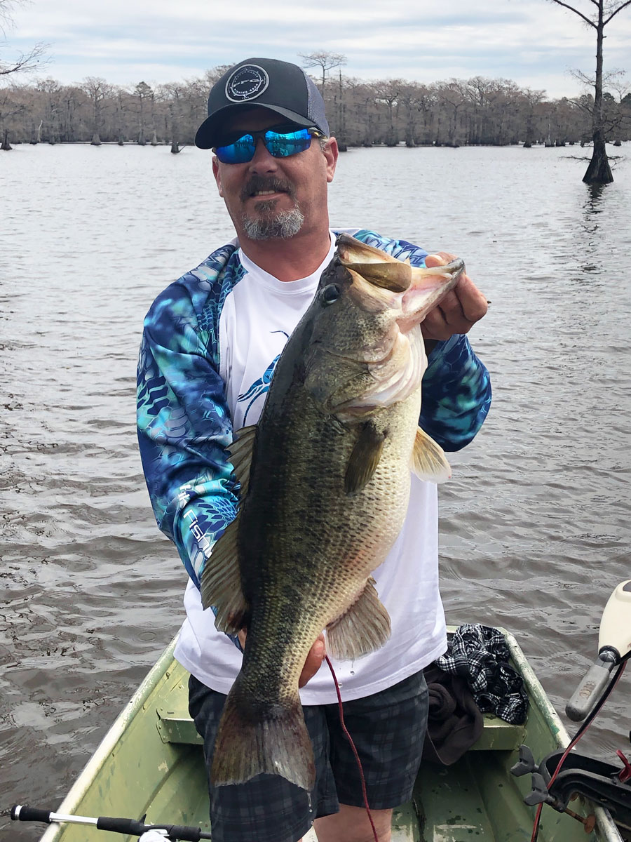 This lunker bass, weighing in at 10.5 pounds and measuring 25 inches long was caught by Corey Harwell with a blue and black lizard on Caddo Lake.
