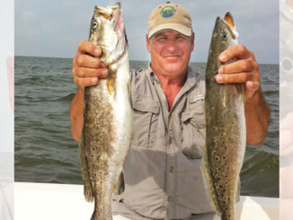 Mike White caught these two mega-trout while fishing Grand Isle last summer.