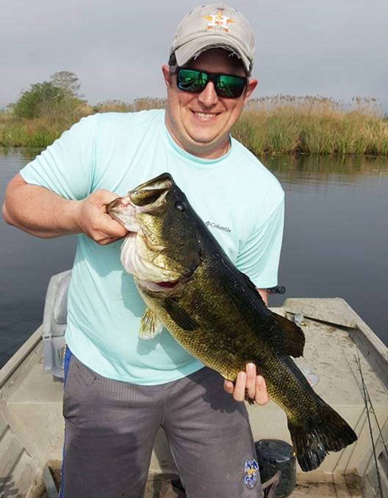 Granger's biggest bass to date is this 11.88-pounder he caught off the bed using a motor oil-colored lizard.