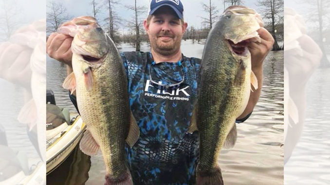 Donovan Stoner, of Atlanta, La., shows off a couple of nice Black Lake bass. Stoner said May is a great month to target postspawn fish before water temperatures really ramp up and summer heat takes hold.