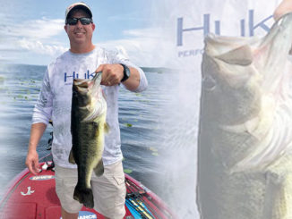 Nick Terry shows off a 61/2-pound bass he caught May 31 while fishing in and around lily pads at Toledo Bend with John Dean. Lily pads should hold the key to getting bit in July, according to Dean.